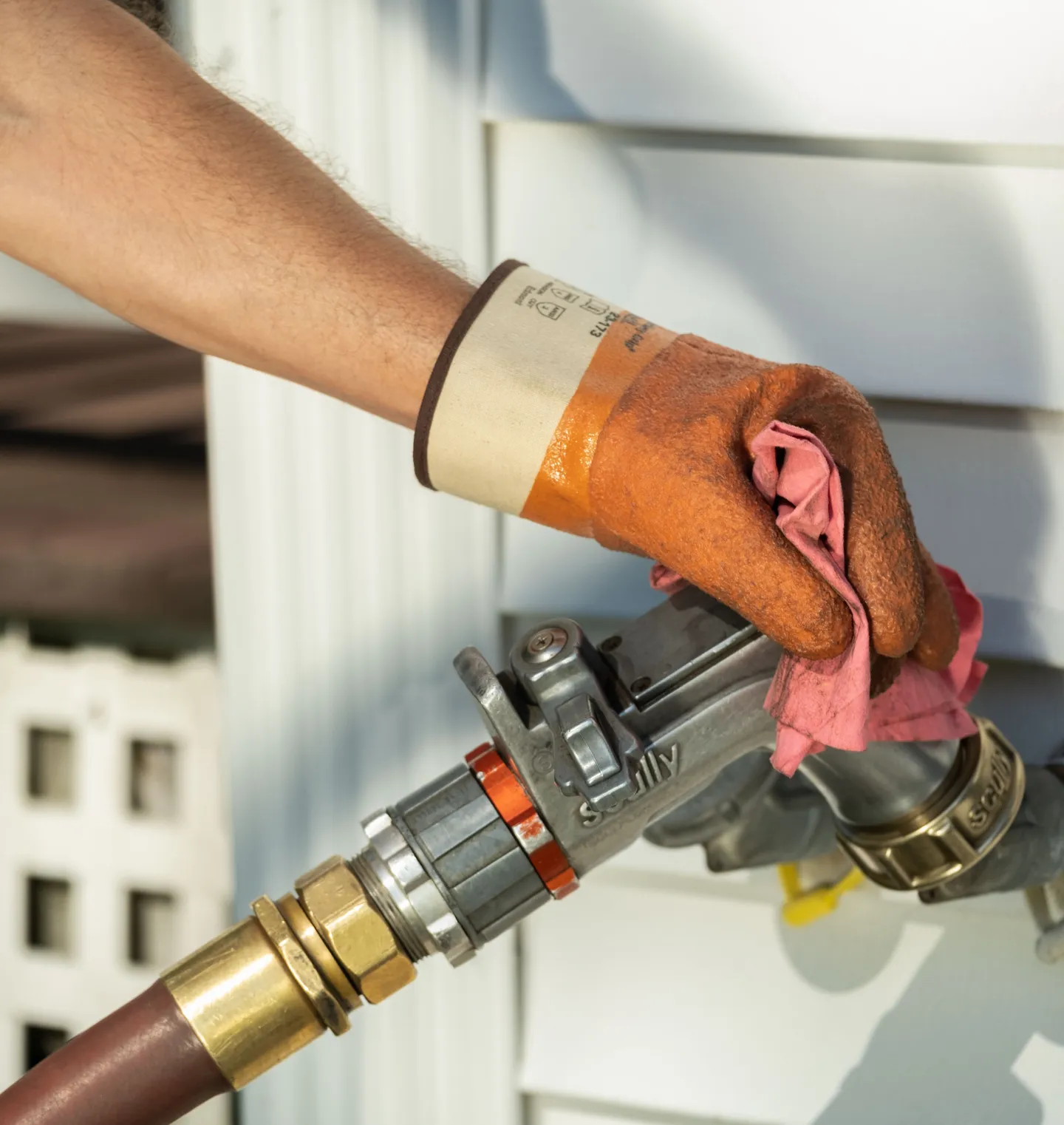 Domino Fuel driver delivering heating oil with a Scully fill nozzle